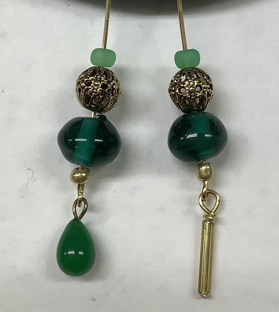 two green and gold, glass and metal bead earrings showing different final bead options